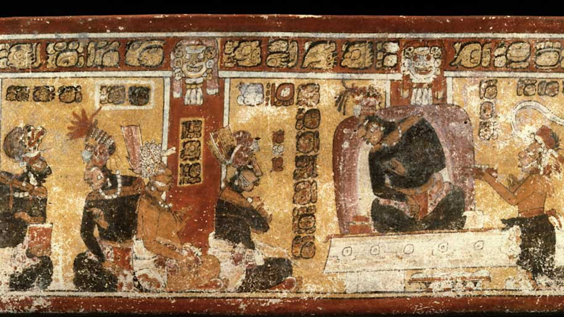 Classic Maya polychrome vase from Dos Pilas showing people covered in black paint. Photo by Justin Kerr, Maya Vase Database.