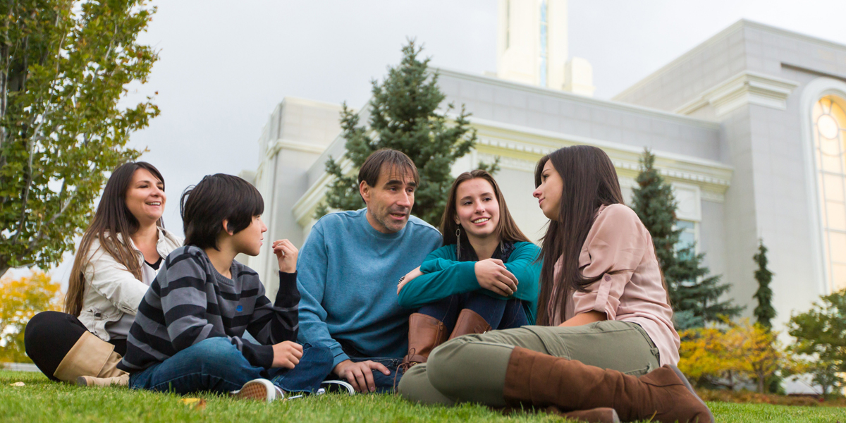 Family Sitting outside a Temple via lds.org