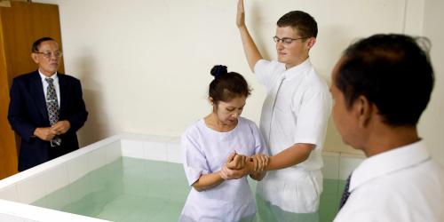 A woman is baptized in Thailand. Image courtesy of The Church of Jesus Christ of Latter-day Saints